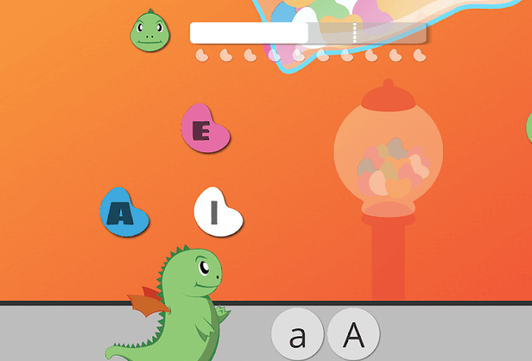 Tablet mostrando o jogo Dom e as letras, do Instituto Domlexia: as letras A, E, I e O em balas coloridas, o dragão Dom e o alternador entre minúscula e maiúscula